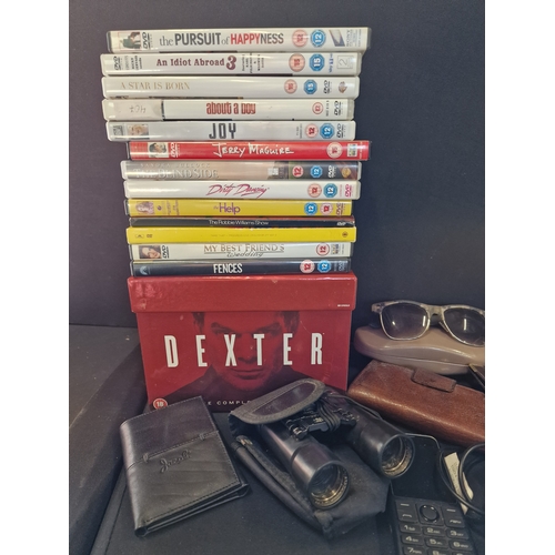 350 - A mixed collection of DVDS, mobile phone, leather wallets and purses, sun glasses, mini binoculars a... 