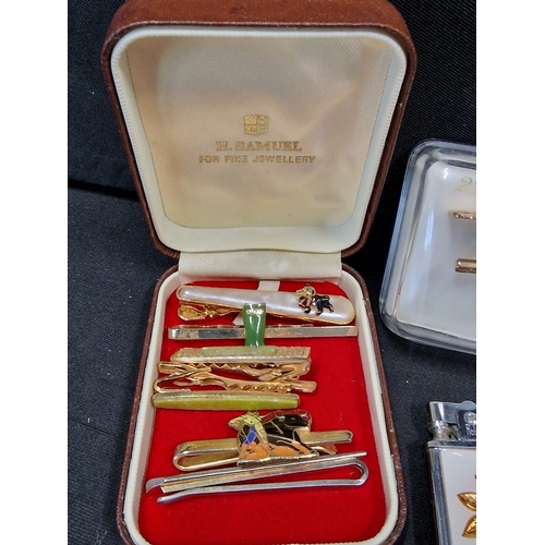 373 - A collection of mens Dress ware items.  Includes 24ct gold plated cuff links, watches, tie pins.