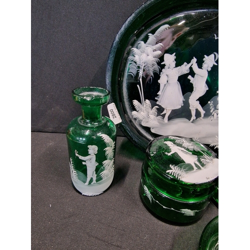 383 - Six pieces of Mary Gregory style bohemian emerald Green glass with white hand painted design.