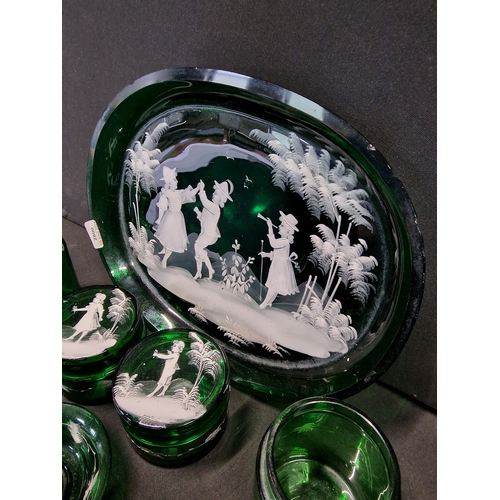 383 - Six pieces of Mary Gregory style bohemian emerald Green glass with white hand painted design.