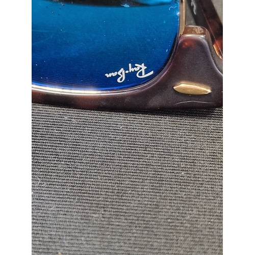 386 - A pair of genuine Rayban clubmaster sun glasses