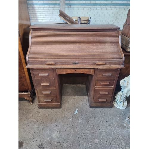 399 - Antique S Scroll roll top desk with 9 drawers