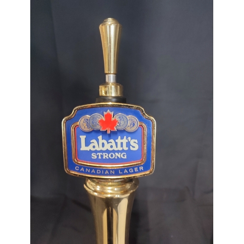 403 - Vintage beer pump with Labatts signage