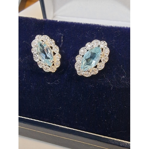 422 - Blue Topaz and CZ earings