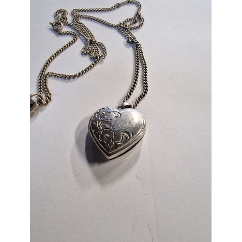 427 - A sterling silver heart lock and a sterling silver chain.