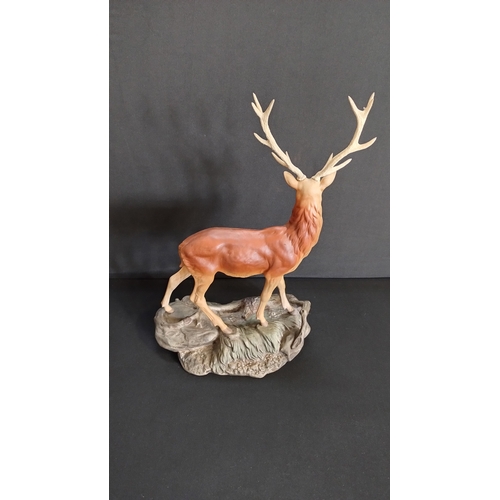 Stunning Beswick stag stood on outcrop of grass , Beswick mark to the ...