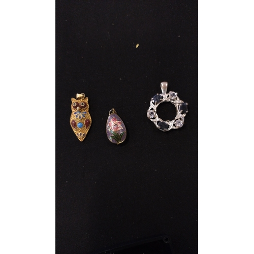 37 - Mixed jewellery items including pendant locket, two rings and other items