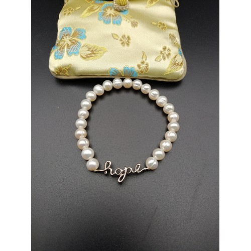 14 - Honora cultured pearl bracelet with sterling silver closure
Comes with box and pouch