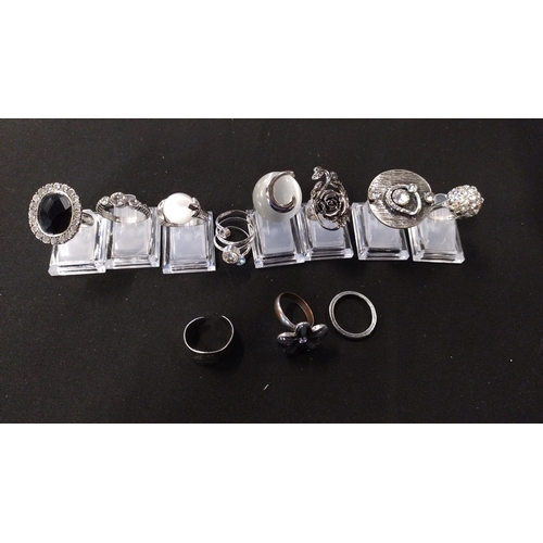 41 - 11 fashion costume rings. Various styles and sizes