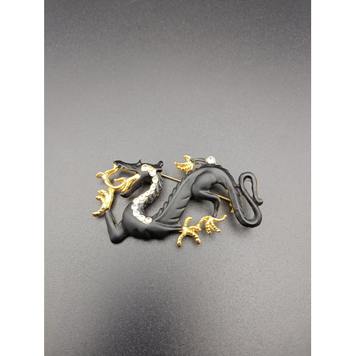 17 - Beautiful Swarovski dragon brooch.  In matt black with gold detail claws and silver detail to neckli... 