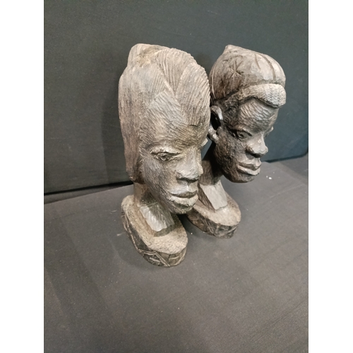 19 - 2 Africana heavy wooden heads measuring approx. 25cm