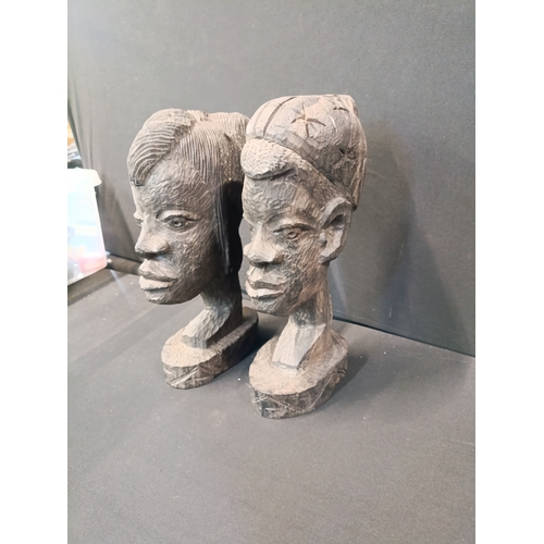 19 - 2 Africana heavy wooden heads measuring approx. 25cm