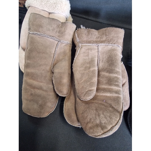 65 - Four pairs or suede leather ladies mittens. Various sizes in black and brown.