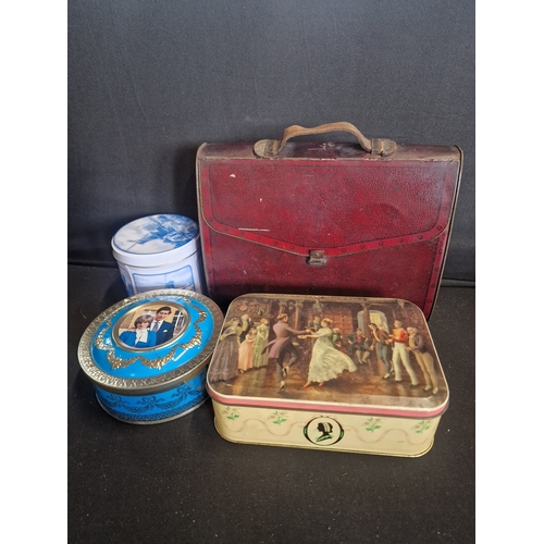 77 - A selection of vintage tins.  Includes Edmondsons red seal toffee (in the shape of a case and a leat... 