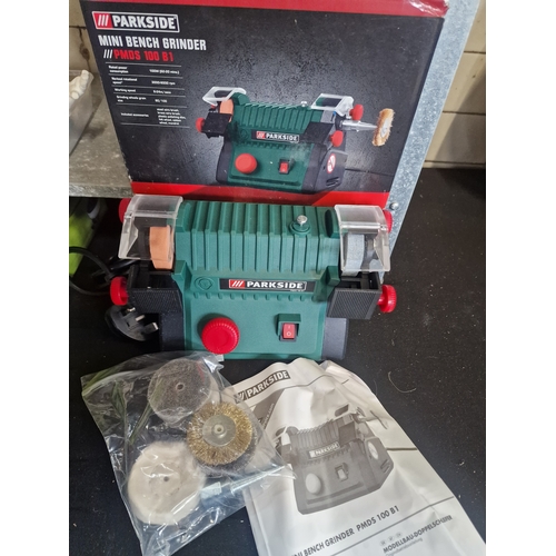 79 - Brand new Bench Grinder. With accessories