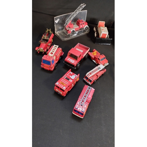 90 - Selection of matchbox and other makes fire engines, Disney Mikey mouse in car and Ford Sierra RS