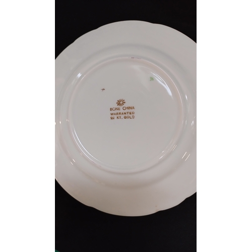 95 - 22 CT gold inlaid tea set, teapot,1 cup, milk jug, sugar bowl and plates and saucers,