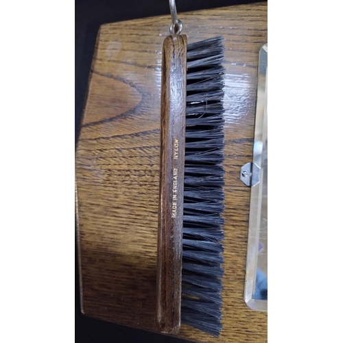 103 - vintage clothes brushes mounted on wooden plaque with mirror 1940s
