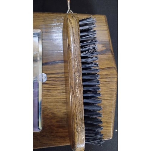 103 - vintage clothes brushes mounted on wooden plaque with mirror 1940s