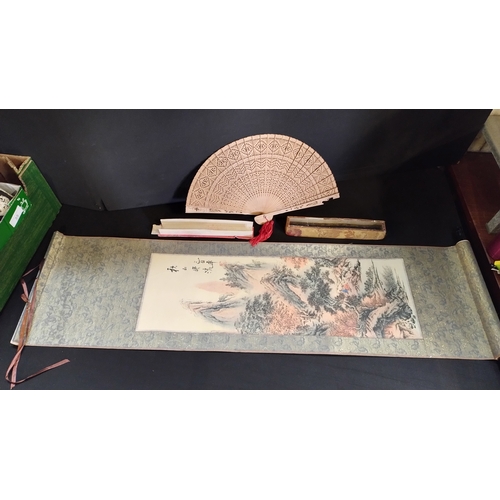 108 - Oriental style decorative silk on cloth scroll measures 90 x 25 cm, and wooden decorative fan in sil... 