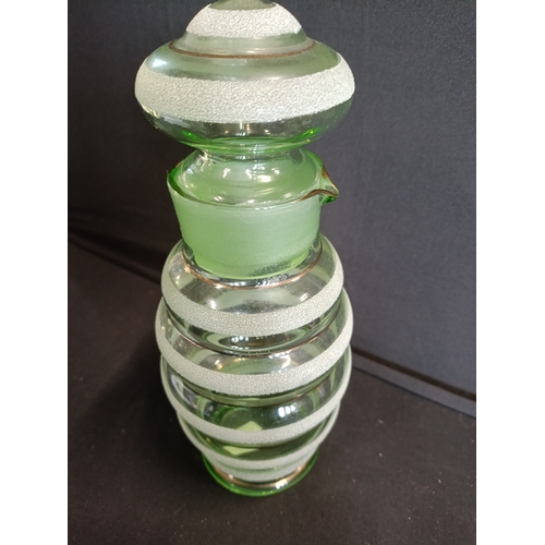 134 - Vintage art deco green glass lidded water jug with sugar frosted bands. Approximately 25cm H