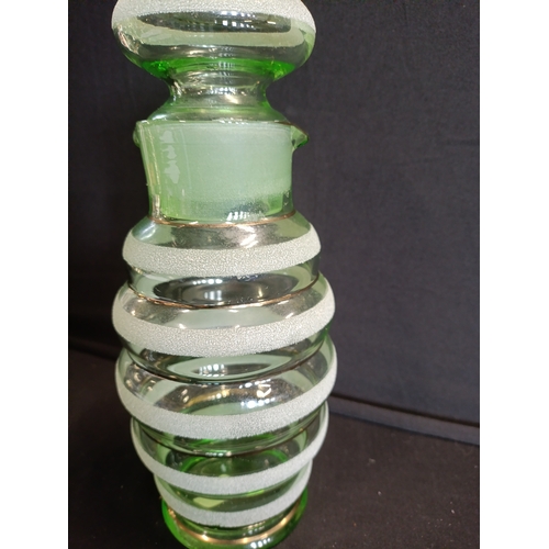 134 - Vintage art deco green glass lidded water jug with sugar frosted bands. Approximately 25cm H