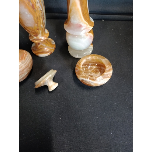 137 - Collection of Onyx items including small vases approximately 15cm tall, an egg and a lidded trinket ... 