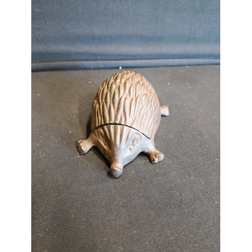 143 - Cast iron Hedgehog storage approximately 5.5cm in height