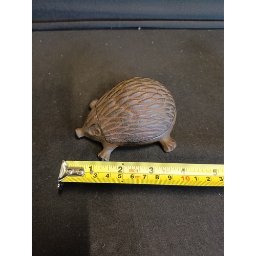 143 - Cast iron Hedgehog storage approximately 5.5cm in height
