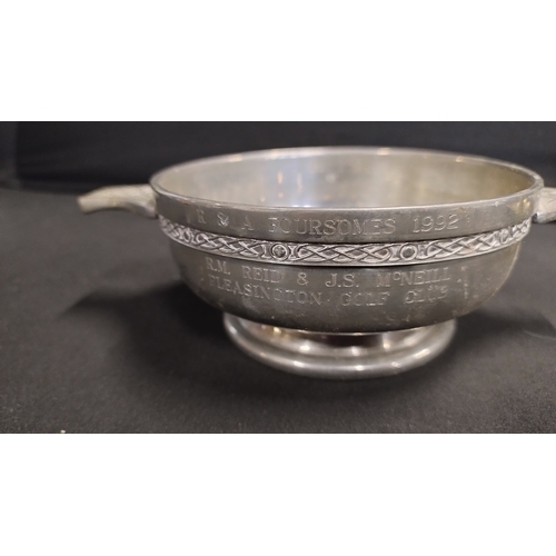 147 - Brass candle holder and a Celtic Knot Handle Pewter Quaich Bowl engraved with 1992 
R&A foursomes go... 