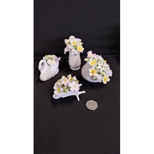 152 - Royal Doulton assorted flower bouquets, and a Royal Doulton double rose vase with markings to the ba... 