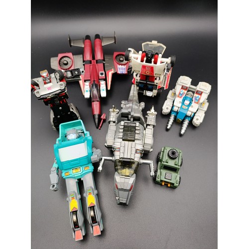 130 - Collection of transformers toys including some Vintage Hasbro models.