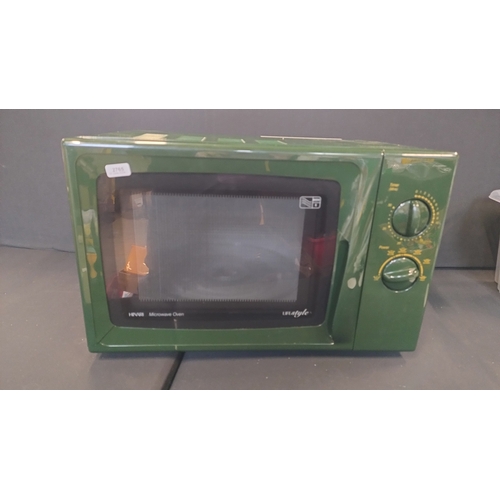 248 - Hinari lifestyle 800wt green microwave oven. Tested and working