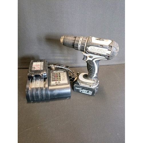 246 - Makita 18v LXT Li-ion 2 Speed Combi Drill with 2 batteries and charger. Tested for power