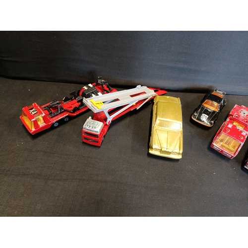 305 - Collection of vintage vehicles including Matchbox, Corgi, Fire engines and a Mooney bank