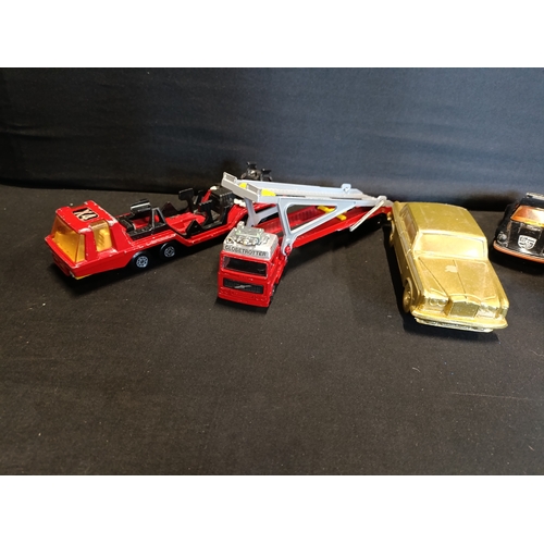 305 - Collection of vintage vehicles including Matchbox, Corgi, Fire engines and a Mooney bank