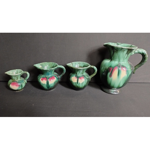 346 - Set of four Vintage Green Enamel Braided Handled Pitcher - Made in Germany measures from 20 inches t... 