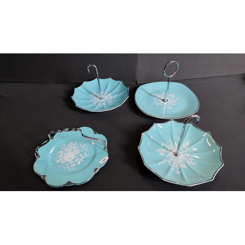 360 - Rare Royal Winton duck egg blue cake plates in various styles, umbrella's, cake stand and others