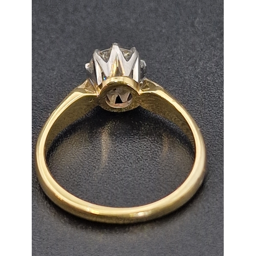 225 - A stunning 0.65ct Diamond solitare.  Set in platinum and 18ct gold 
Weight approximately 2.86g