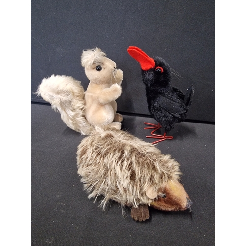 350 - Three vintage Steiff -  Hucky the raven, mohair possy the squirrel and Joggi the hedgehog.