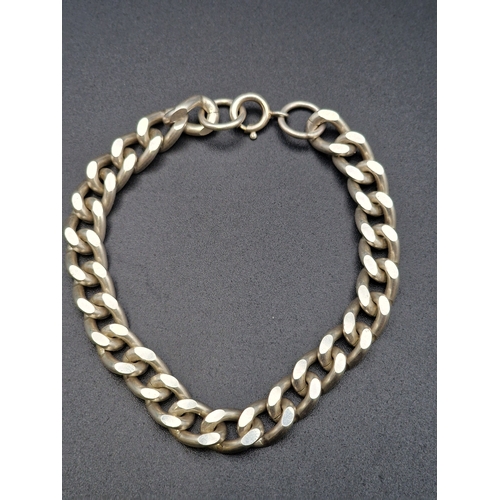 230 - A vintage men's Heavy sterling silver curb bracelet