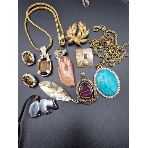 233 - A selection of costume jewellery includes Sworswarovski crystal set and dendritic jasper.