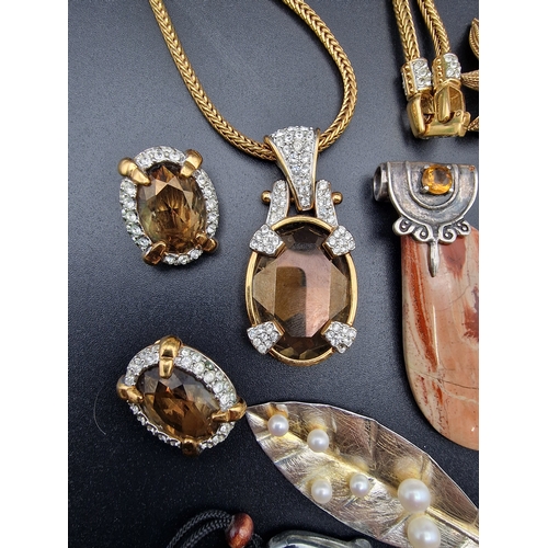 233 - A selection of costume jewellery includes Sworswarovski crystal set and dendritic jasper.