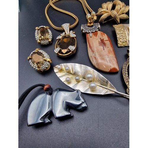 233 - A selection of costume jewellery includes Sworswarovski crystal set and dendritic jasper.