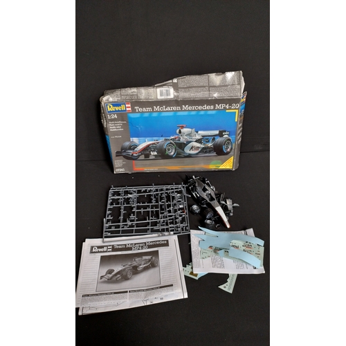 377 - Sepecat Jaguar 1/44 Scale model kit and a 1:24 Team McLaren Mercedes MP4-20 model kit