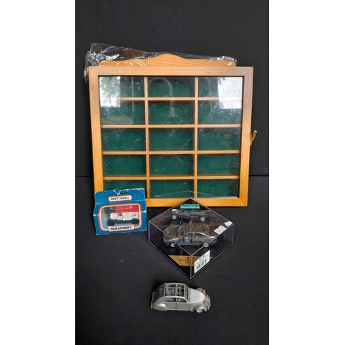 379 - Wooden glass fronted display cabinet, matchbox dale farm delivery van, corgi Citroen CV2, Vitess Ren... 