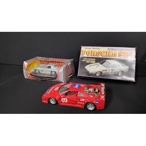 370 - 3 model cars, remote control Porsche 924 boxed, burago Ferrari F40 (1987) and a burago Mercedes Benz... 