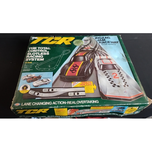 382 - TCR Slotless Racing System 21 feet, Zig Zag Raceway 3 car system