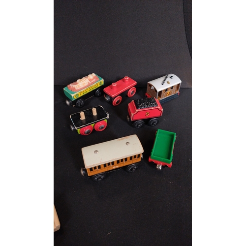 385 - Thomas the tank engine wooden train track and various other pieces and a child's telescope