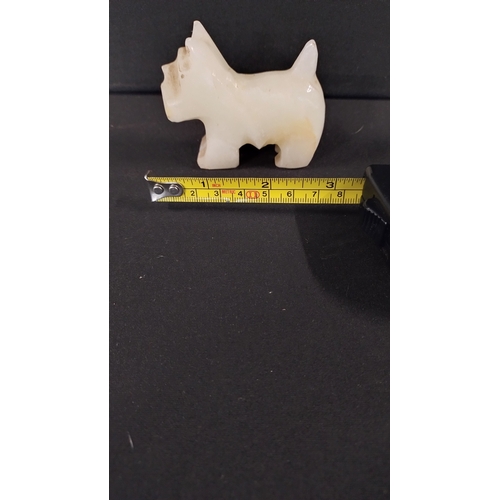 388 - White Quartz Scotty dog measures 6 x 7 cm